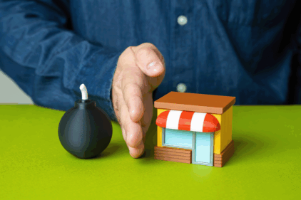 Man protects shop from bomb, concept. Business protection, damage insurance.